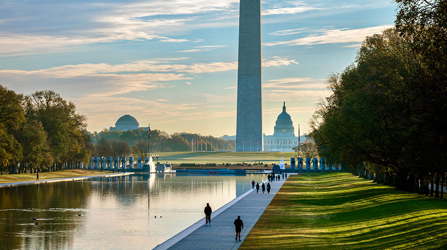 The Washington Monument and U.S. Capitol Building seen from the Lincoln Memorial Reflecting Pool on the National Mall in Washington, D.C.